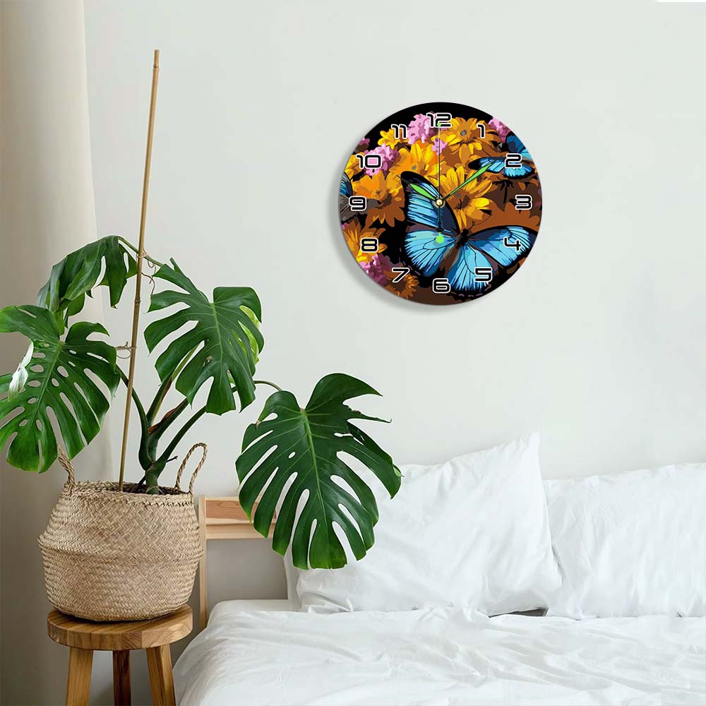 Decorative wall clock with butterfly and floral design in a bedroom setting.
