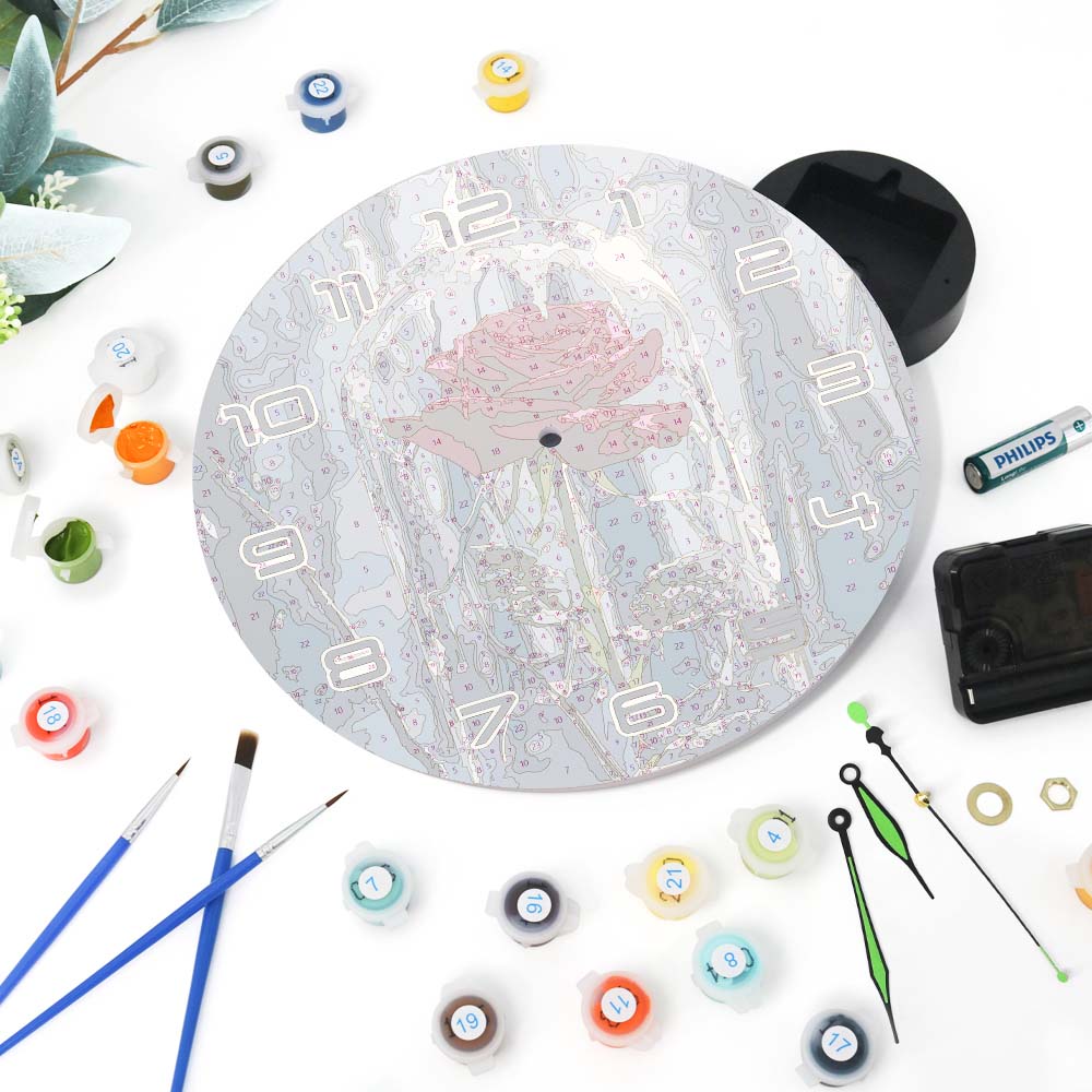 Round clock with decorative elements on a white background