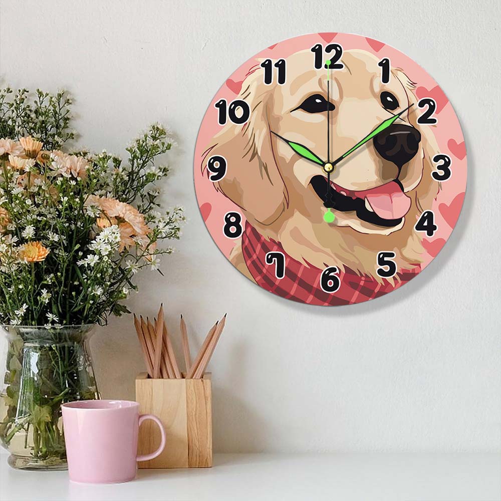 Wall clock with a dog design on a white wall, next to a vase of flowers and a pink mug.