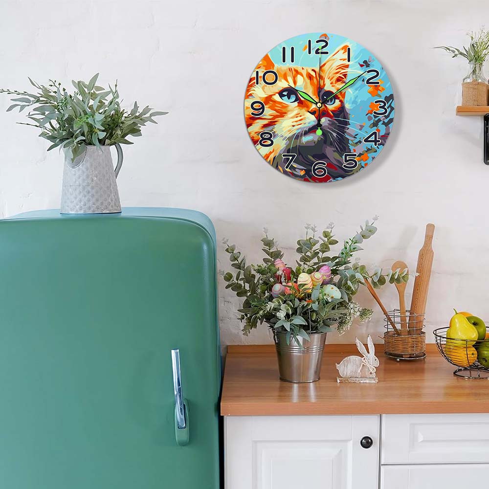 Wall clock with a cat design in a kitchen setting