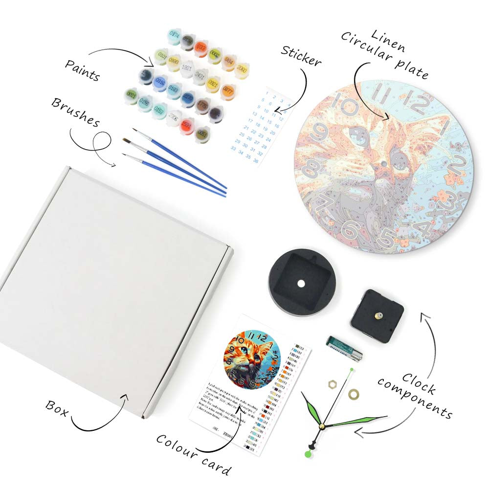 Set of art supplies including paints, brushes, a box, a color card, a clock with a cat design, and other components on a white background.