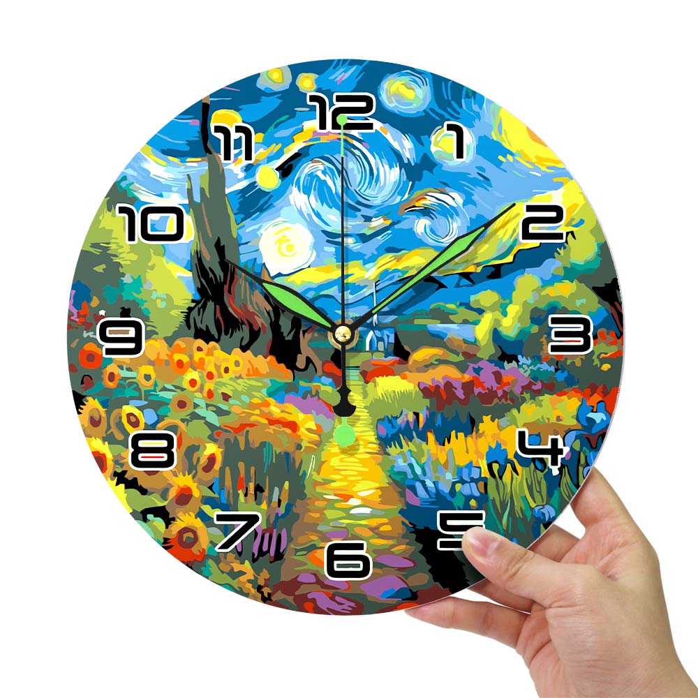 Colorful abstract wall clock held by a hand on a white background