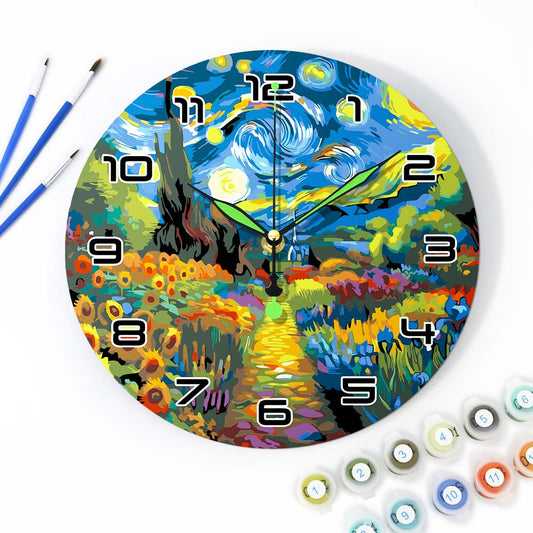 Colorful wall clock inspired by Van Gogh's 'Starry Night' with painting supplies around it.