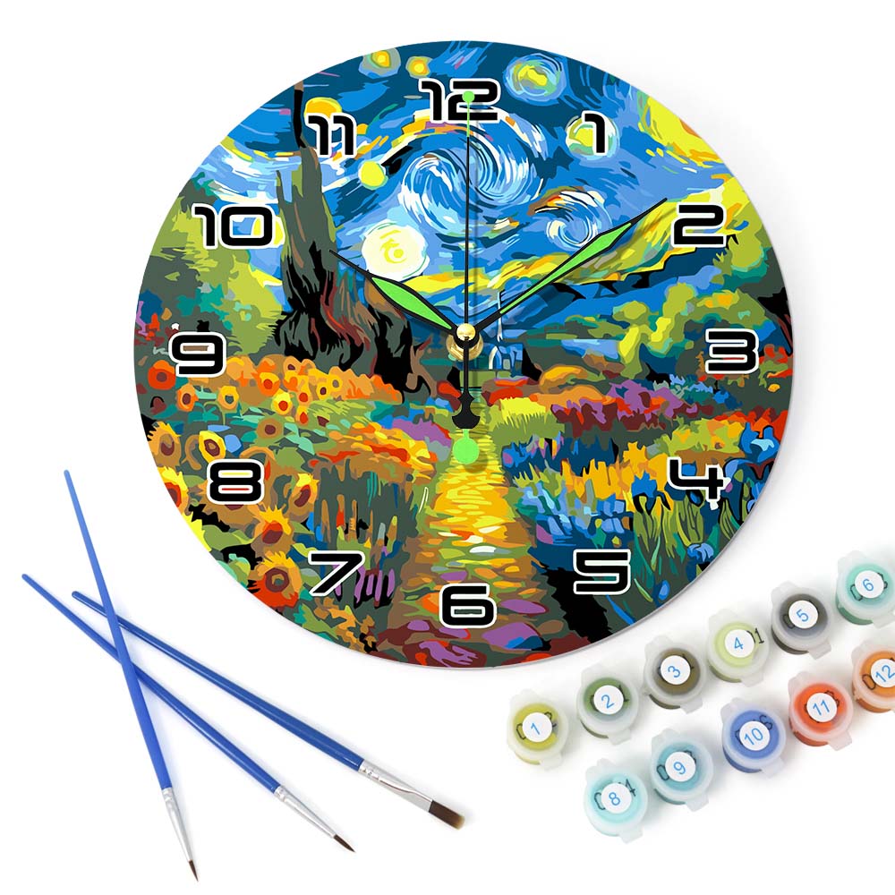 Decorative clock with artistic design, paintbrushes, and paint tubes on a white background