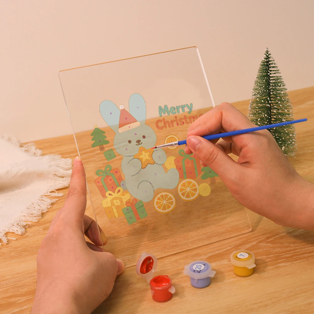 
Paint by Numbers - Christmas Light | Blue Bunny with a Golden Star