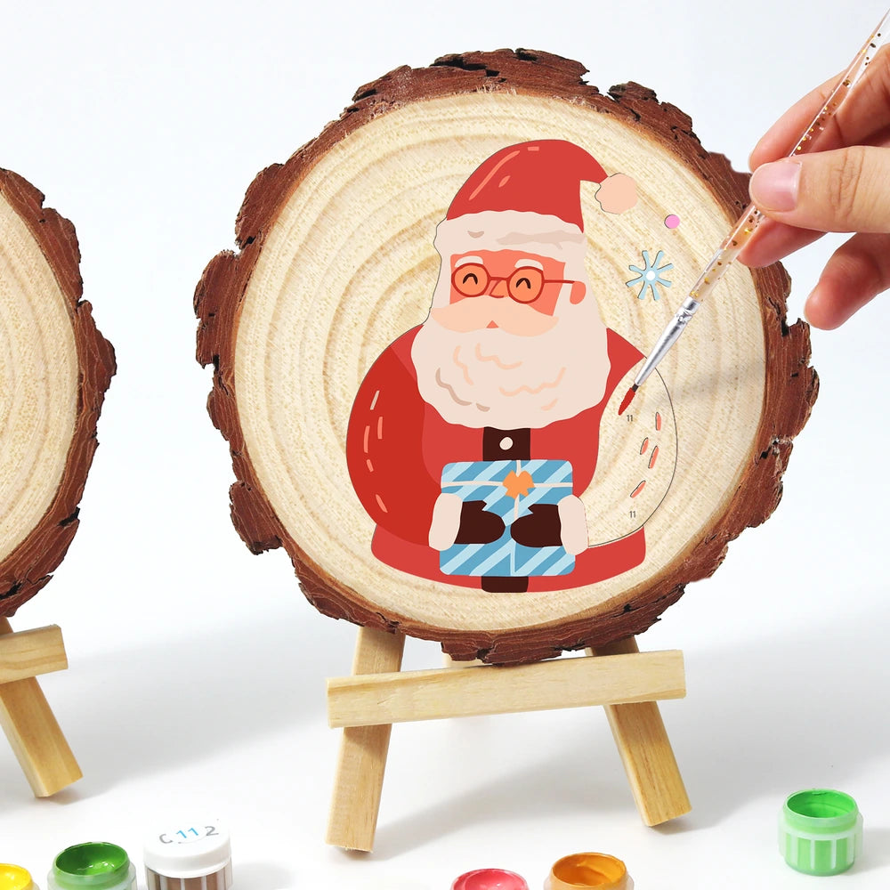 
Paint by Numbers - Wood Slice | Santa with a Blue Gift