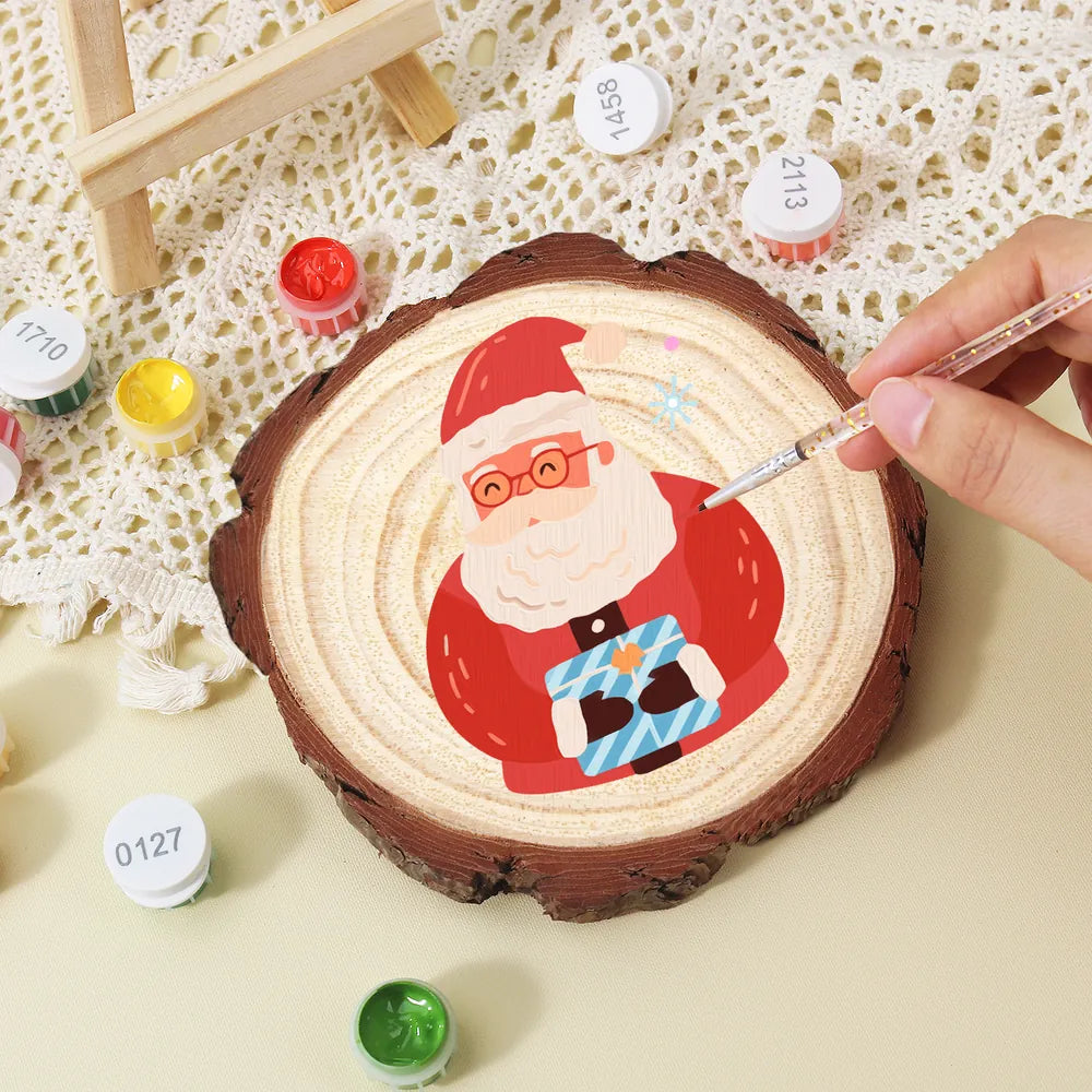 
Paint by Numbers - Wood Slice | Santa with a Blue Gift