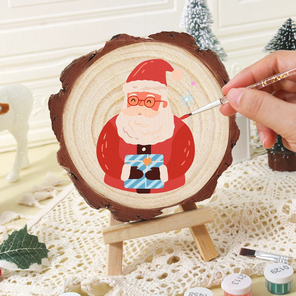 
Paint by Numbers - Wood Slice | Santa with a Blue Gift