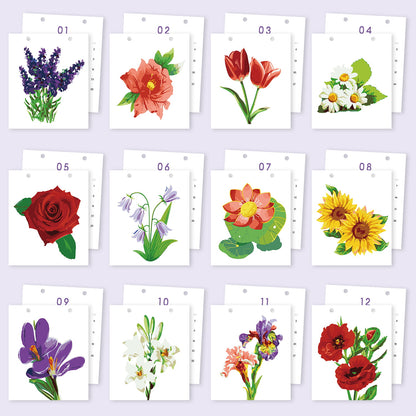 A set of 12 small white cards arranged in a grid on a pale lavender background. Each card shows a different floral illustration with a number printed above it, such as lavender, a coral flower, tulips, daisies, a red rose, bluebells, lily of the valley, sunflowers, crocuses, lilies, irises, and poppies.