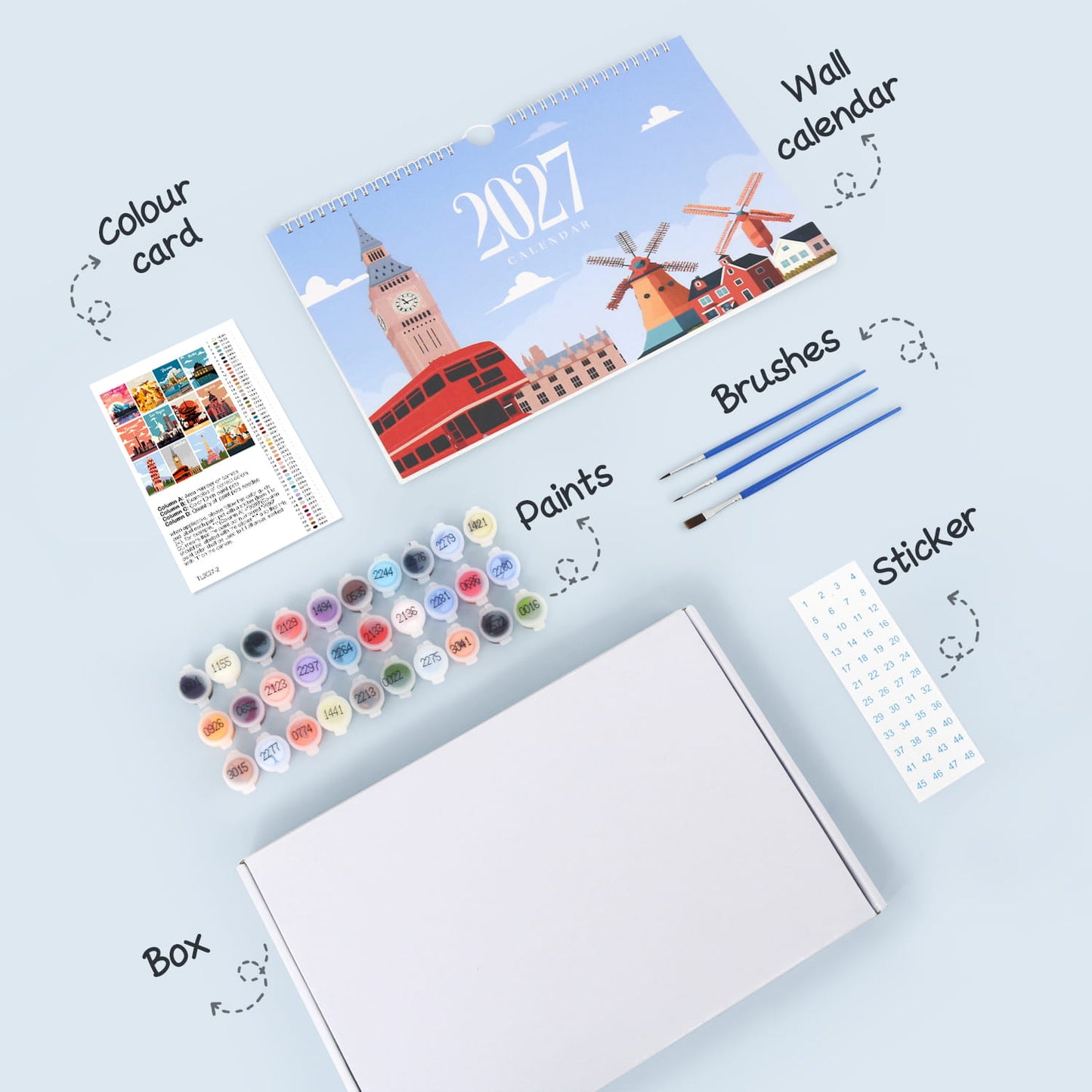 A flat-lay view of a painting and wall calendar kit on a light blue background, showing a white box, a colorful 2027 wall calendar, paint pots, brushes, a sticker sheet, and a color card.
