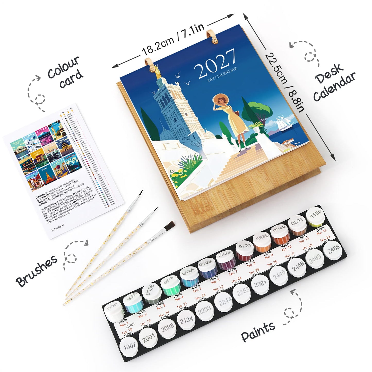 Artistic set with a 2026 calendar, paint set, brushes, and color card on a white background.