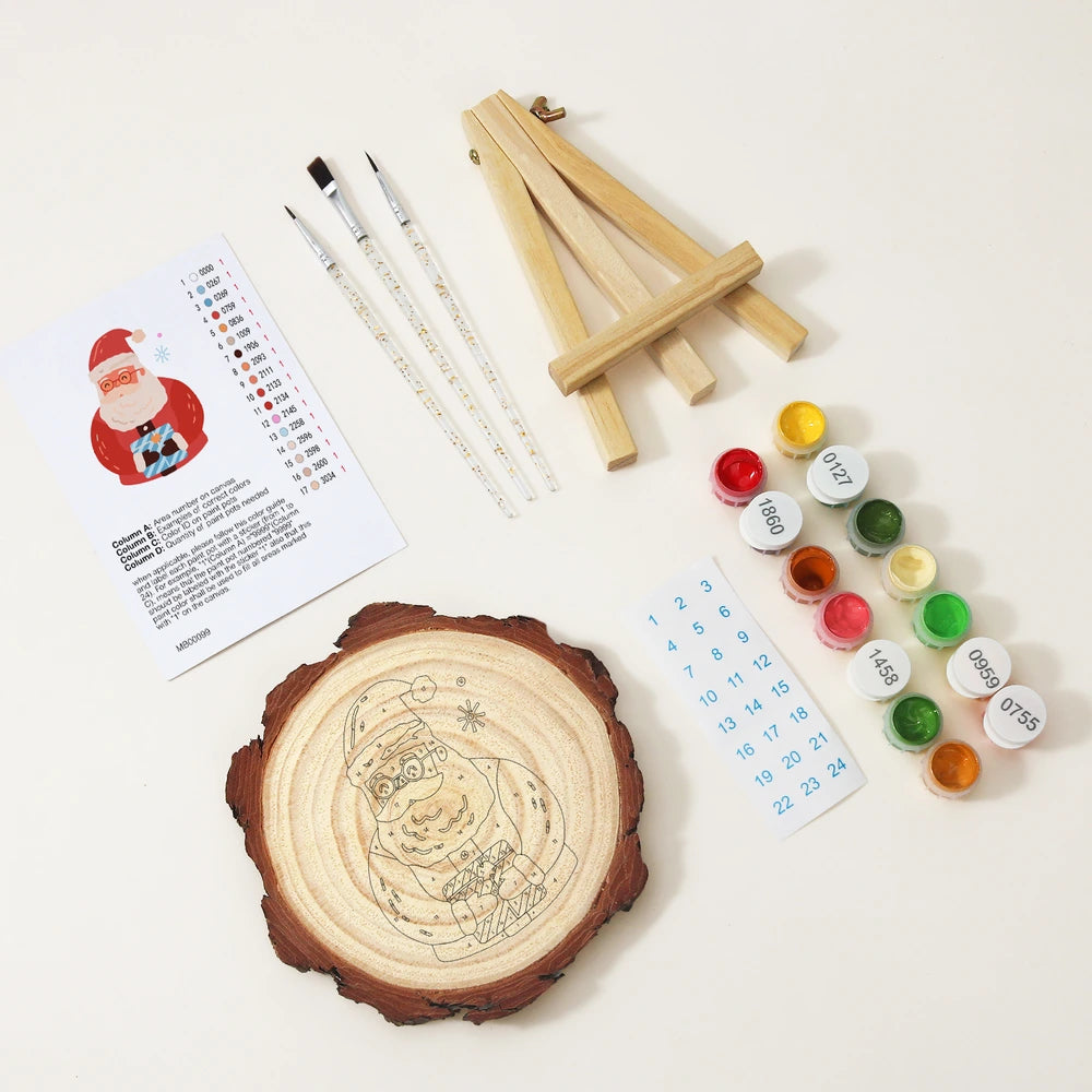 
Paint by Numbers - Wood Slice | Santa with a Blue Gift