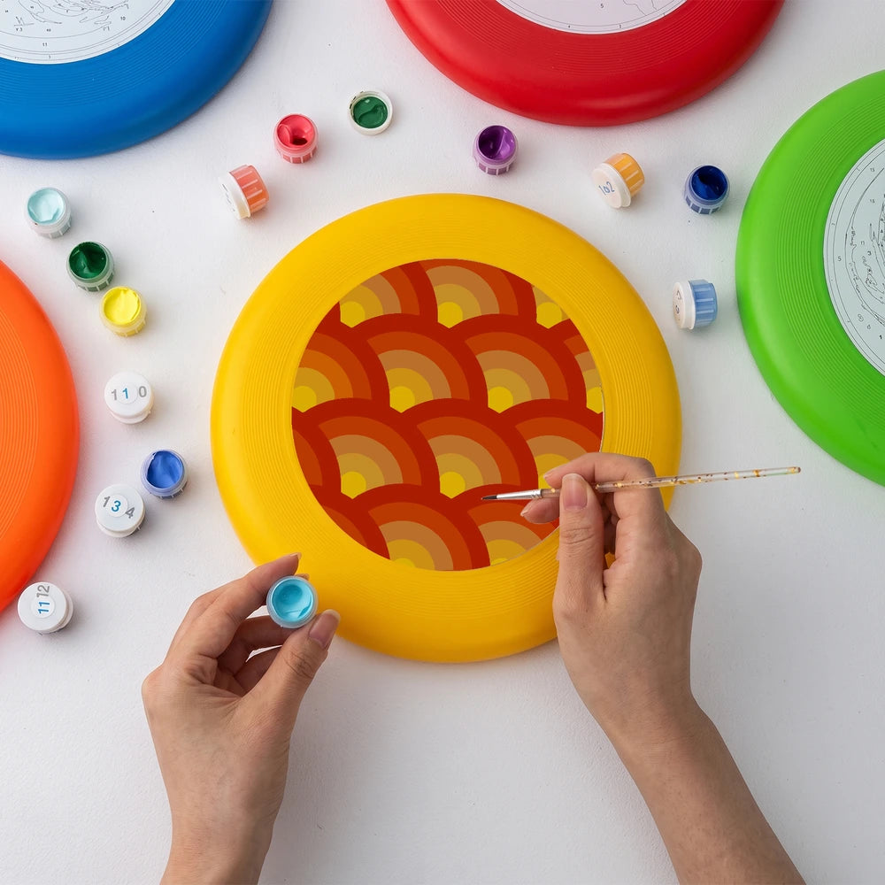 
Paint by Numbers - Frisbee | Orange Scale Pattern