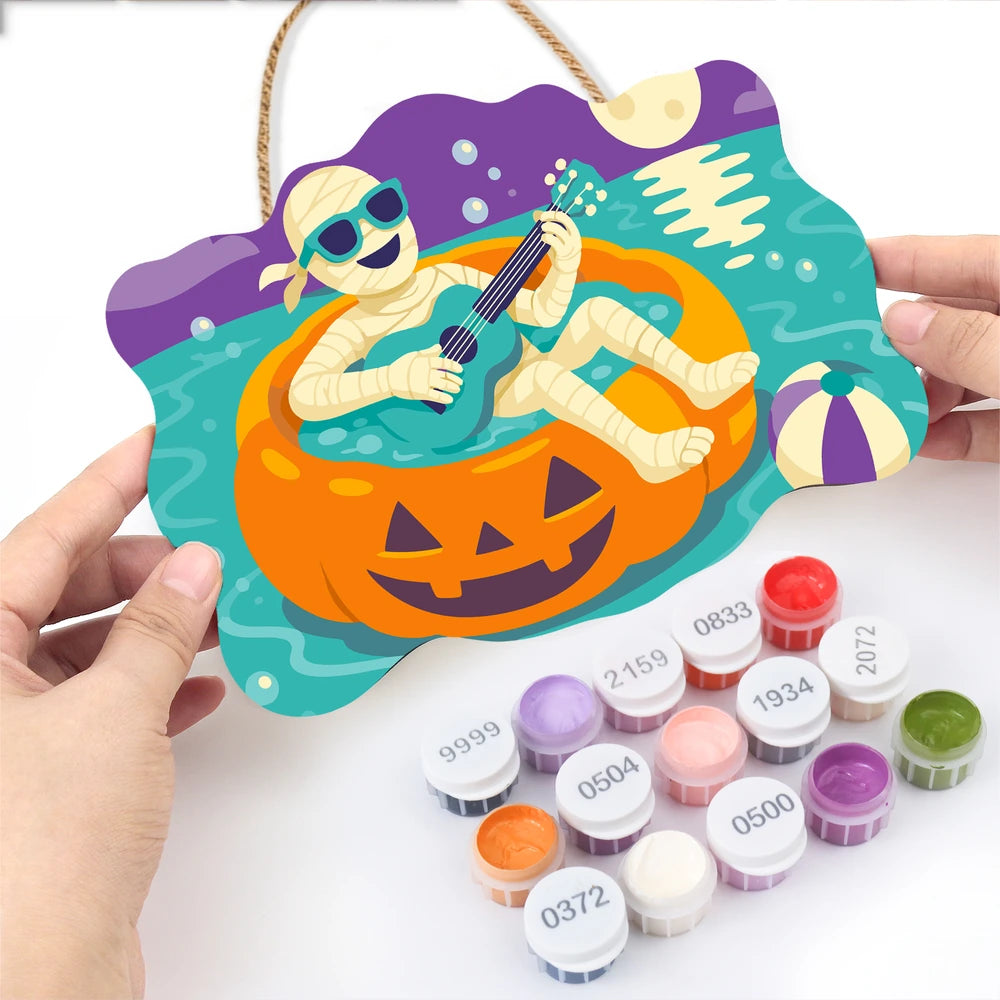 
Paint by Numbers - Wooden Door Hanger | Mummy Playing Ukulele on a Pumpkin Float