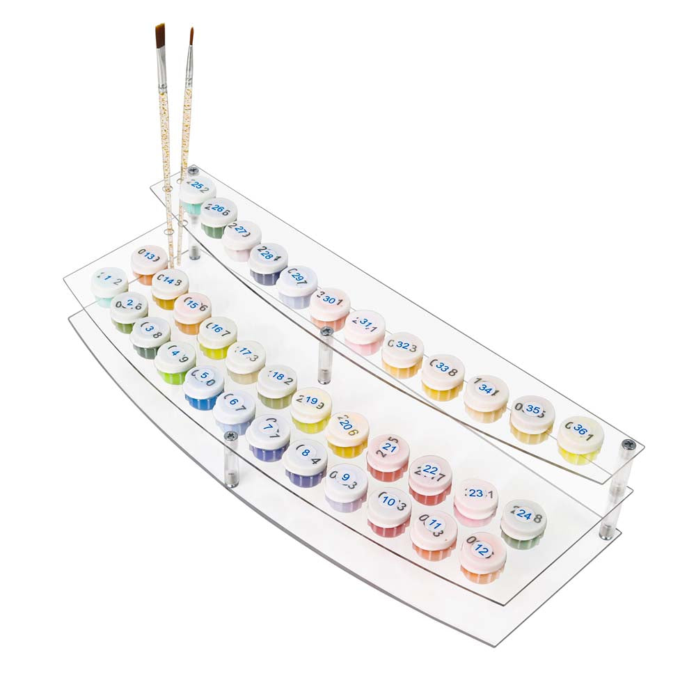 
Acrylic paint swatch holder with paintbrushes on a white background