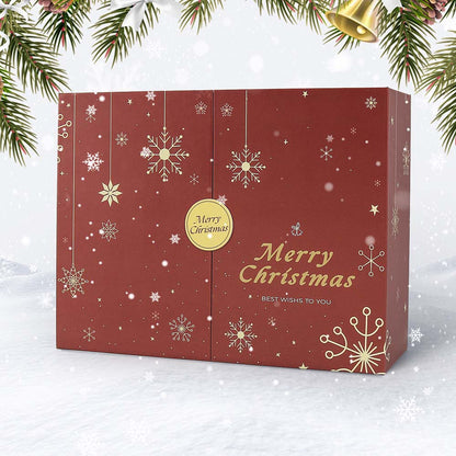 Red Christmas gift box with gold snowflakes and 'Merry Christmas' text on a snowy background.
