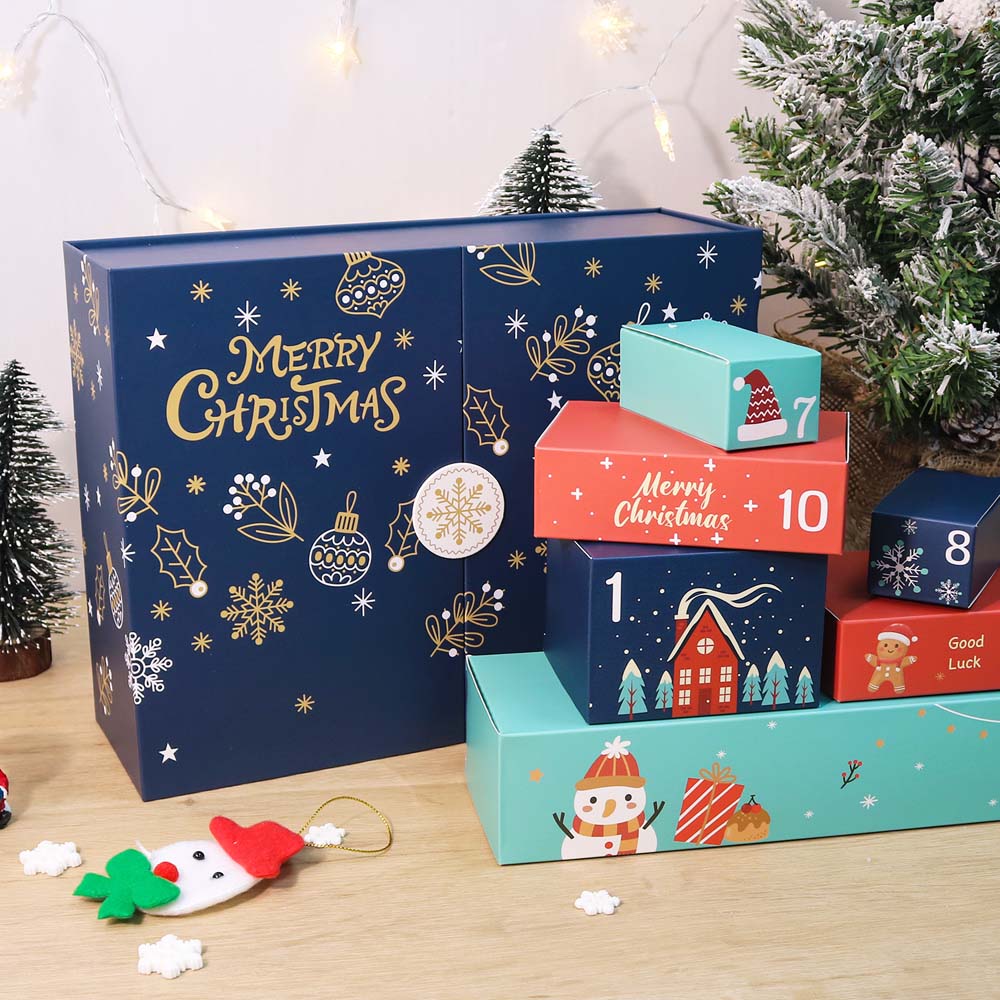 Advent calendar with colorful boxes on a wooden surface, Christmas tree in the background