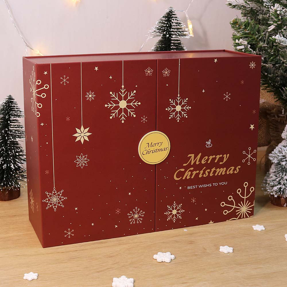 Red Christmas-themed box with snowflakes and 'Merry Christmas' text, surrounded by decorative trees.