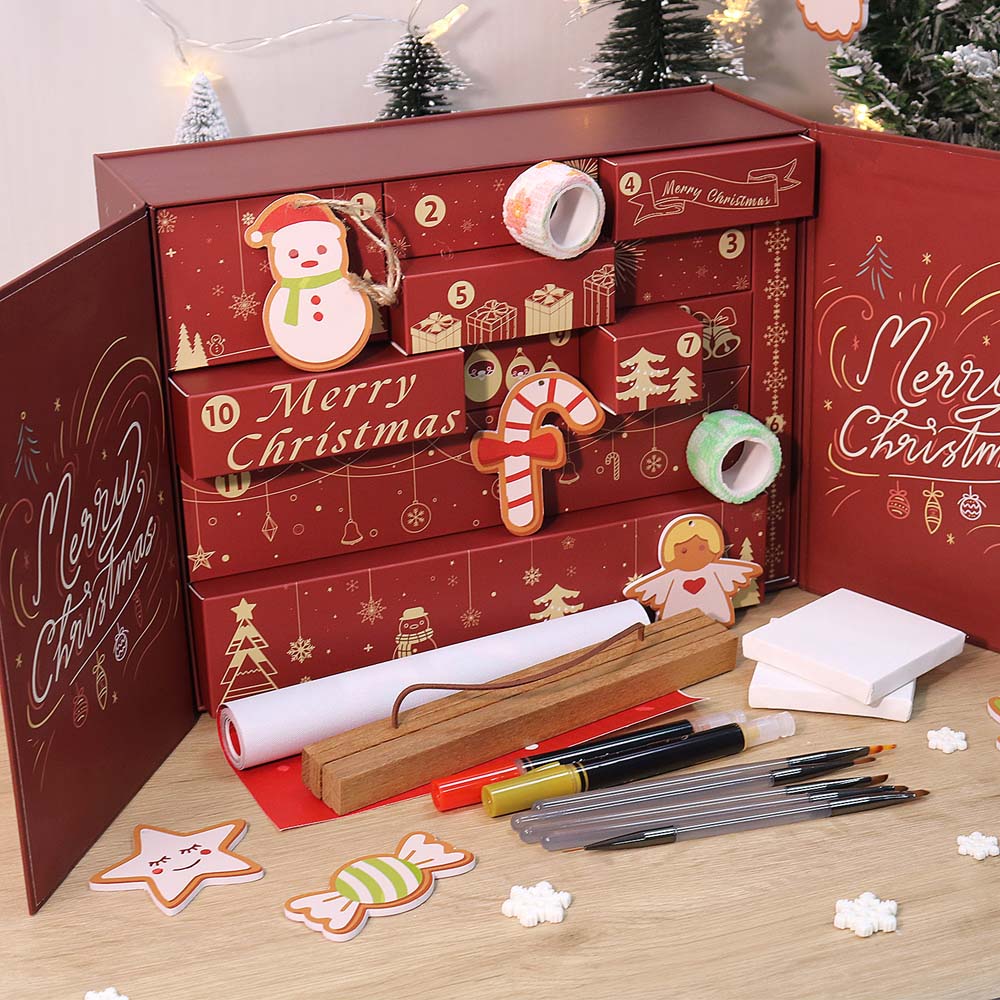 Red Christmas-themed advent calendar with stationery items on a wooden surface
