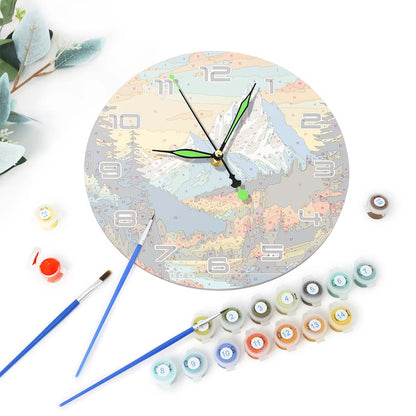 Decorative clock with paint supplies on a white background