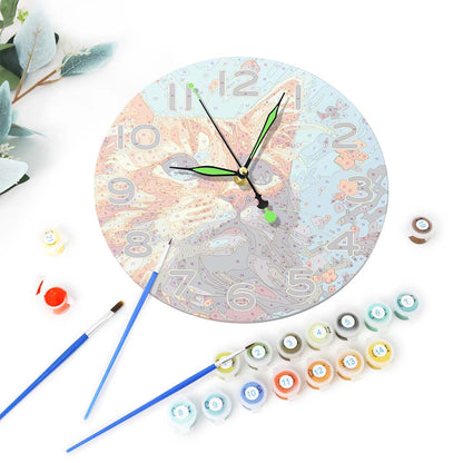 Decorative clock with paint cans and brushes on a white background