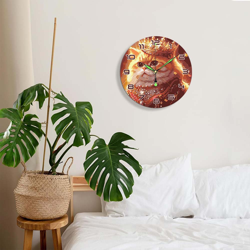 
Wall clock with cat design in a bedroom setting