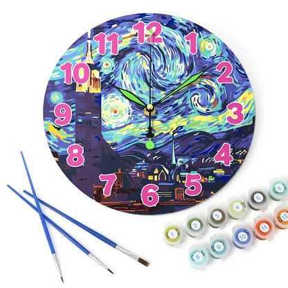Decorative clock inspired by 'Starry Night' with paintbrushes and paint bottles on a white background